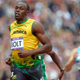 Illustration for article titled Photos Of Usain Bolt Looking Bored As He Blows Past The Best Runners In The World